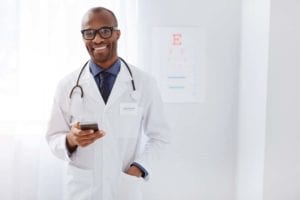 Doctor with a mobile phone